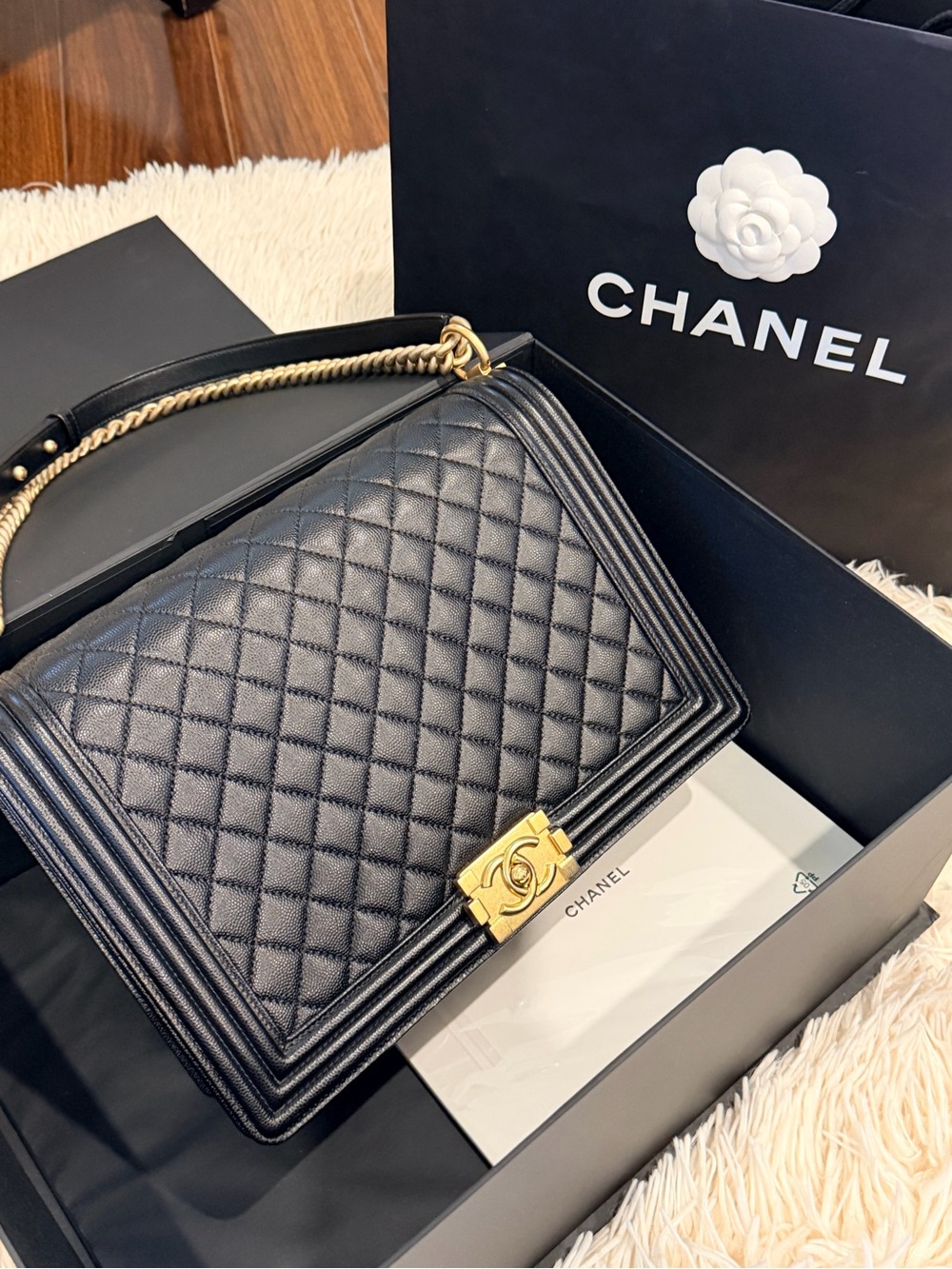 CHANEL Black Quilted Shoulder Bag with Gold Hardware and Chain Strap